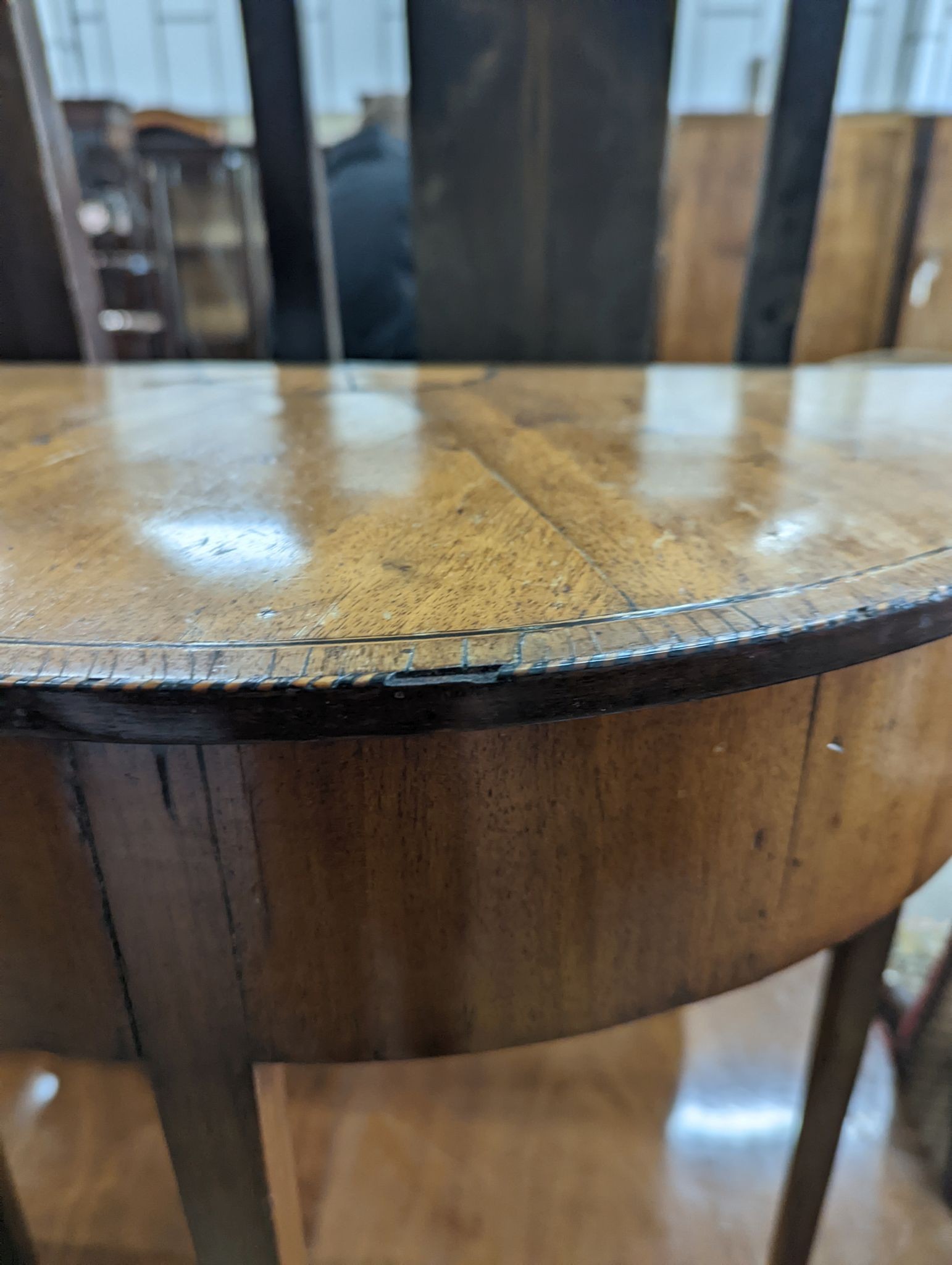 A pair of George III style inlaid mahogany D shaped side tables, width 64cm, depth 32cm, height 71cm